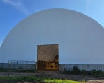 New fabric installed on the building end wall.